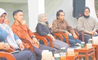Rini Juita dalam kegiatan Diskusi Publik Gerakan Tolak Politik Uang