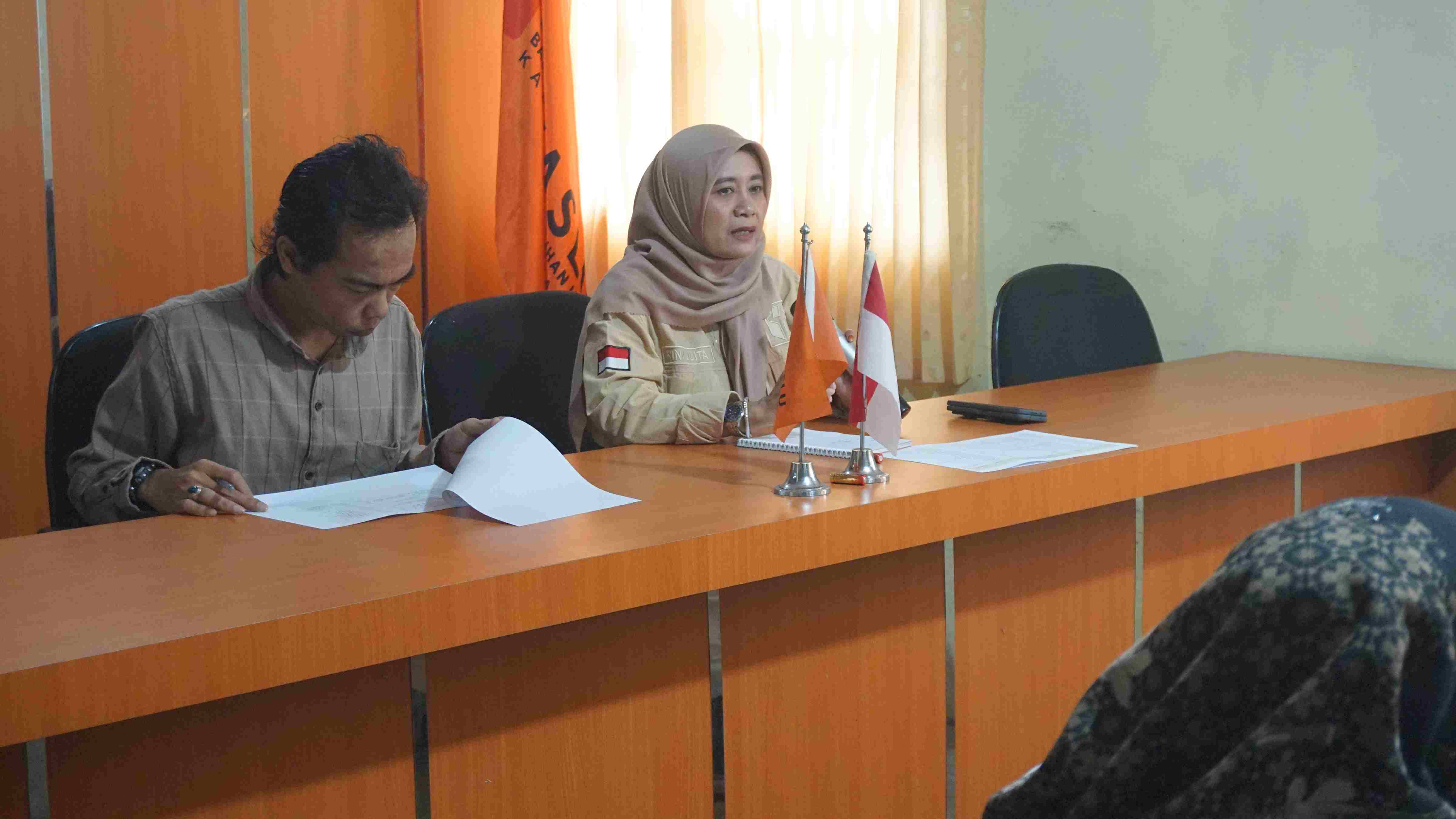 Rini Juita dalam kegiatan  Persiapan Monev