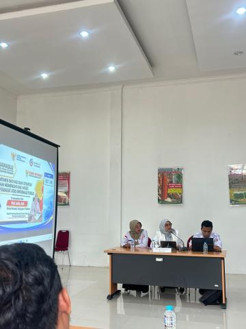 Rini Juita ketua Bawaslu Pasaman dalm kegiatan presentasi Monev KI Sumbar 2026
