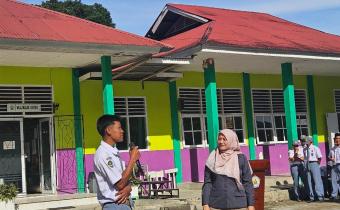 Rini Juita dalam kegiatan Sosialisasi Partisipatif